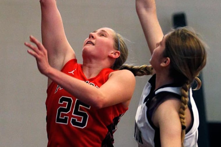 Germantown Academy's #25, Margaret Ann Hubbell, left, drives to the
basket around Baldwin's #44, Jen Motter. Feature on Germantown Academy
girls' basketball player Margaret Ann Hubbell.
During GA's game at Baldwin, need shots of Hubbell in action.
12/13/2013 ( MICHAEL BRYANT / Staff Photographer )