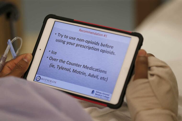 Before his surgery, Eric Williams watches a video about opioids at the Rothman Institute Orthopaedic Specialty Hospital in Bensalem.