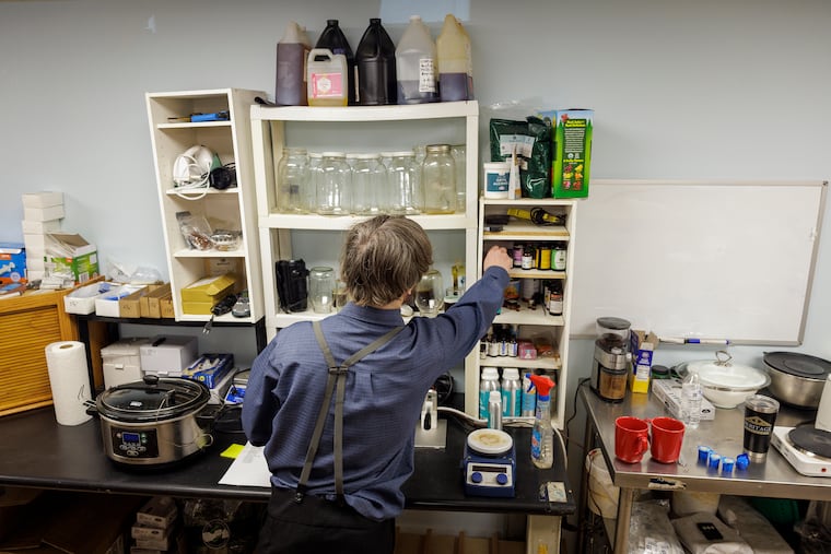 Reuben Riehl, owner of Lancaster County Marketing, works on a custom CBD order for a client. Riehl dreams of selling his CBD products nationally, transforming Lancaster into a major player in the cannabis industry.