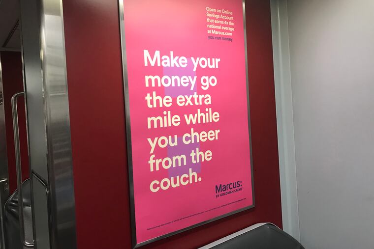 Advertisement on SEPTA regional rail trains for Marcus, Goldman Sachs' mass-market appeal to middle class investors, named for Marcus Goldman, who founded the firm in 1869.