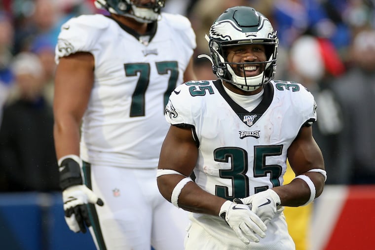 Eagles running back Boston Scott smiles after scoring a touchdown against the Bills.