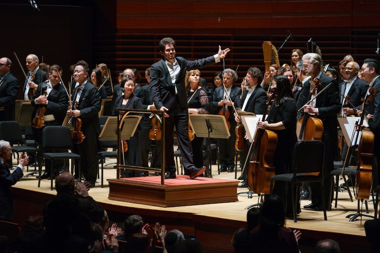 Lahav Shani and the Philadelphia Orchestra at the end of Thursday’s concert at the Kimmel Center.