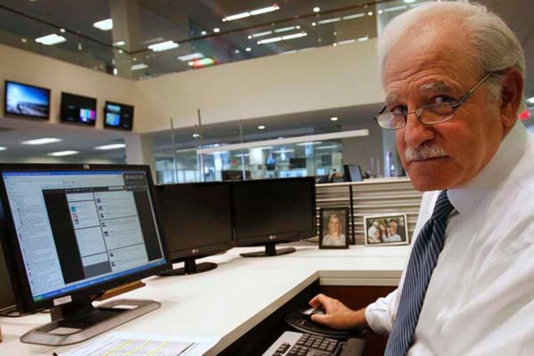 Photograph of 6 ABC anchor Jim Gardner at his desk where he tweets. Photograph from Friday afternoon April 5, 2013.
