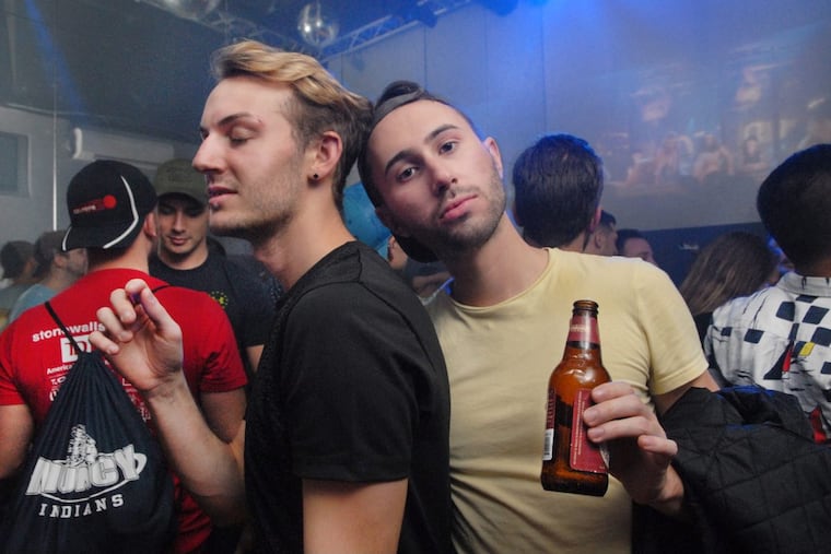 Couples dance in the Ascend Lounge upstairs at Tavern on Camac.