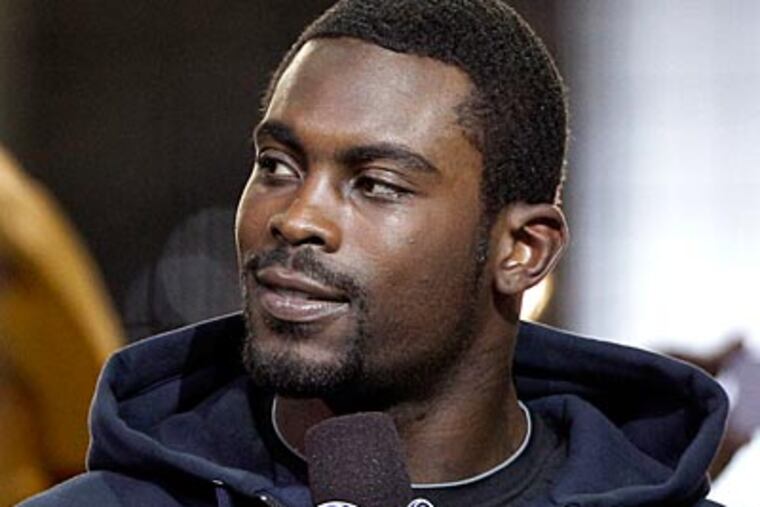 Michael Vick did not attend What It Takes, a program that mentors young kids to finish school. (Tony Gutierrez/AP Photo)