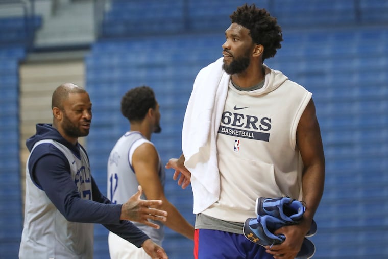 The Sixers gave P.J. Tucker (left), Joel Embiid (right) and James Harden the night off in Monday's preseason opener against the Brooklyn Nets at the Barclays Center.