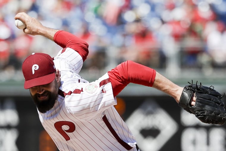 Pat Neshek pitches against the Padres on Sunday.
