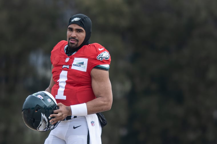 Quarterback Jalen Hurts looks on during Eagles practice at the NovaCare Complex last Thursday.