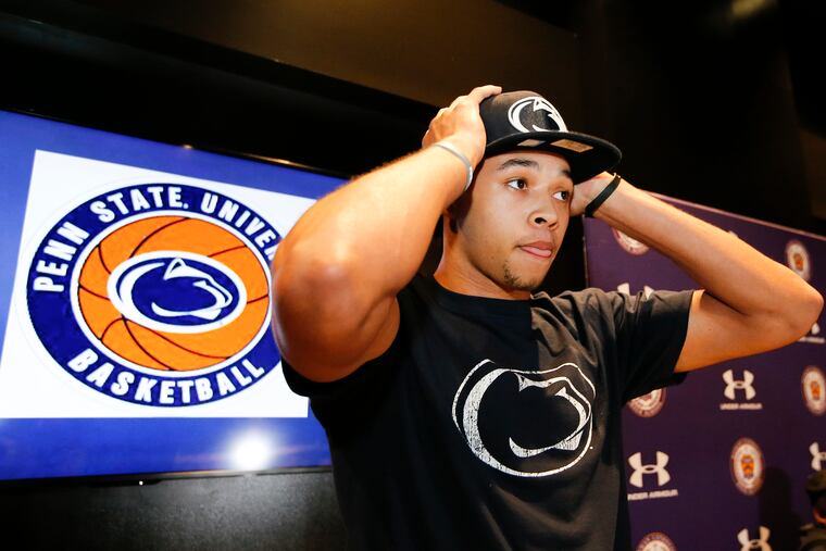 Roman Catholic High School basketball star Seth Lundy shows off his Penn State attire after announcing he will attend Penn State next year.