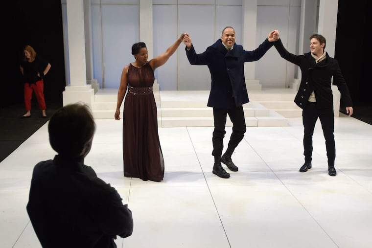 Director Patrick Mulcahy watches as Rosalyn Coleman and Keith Hamilton Cobb rehearse their roles as power couple Calpurnia and Julius Caesar along with Spencer Plachy as Marc Antony (right).