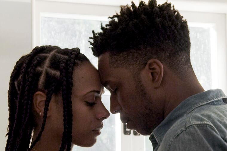 Nicolette Robinson (left) and Leslie Odom Jr. in a scene from Freeform's two-night miniseries "Love in the Time of Corona," in which the Robinson and Odom, who are married, play a married couple, who like themselves, have a young daughter. The series was filmed in their home and those of other actors, some of whom were also quarantined together.