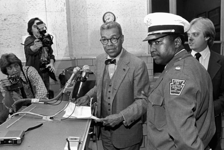 Chuck Stone speaks to news media after mediating a hostage situation at Graterford prison Nov. 2, 1981. ASSOCIATED PRESS