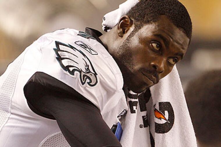 The Eagles' season still hinges on Michael Vick's health - including his arm, his legs, and his head. (Yong Kim/Staff file photo)