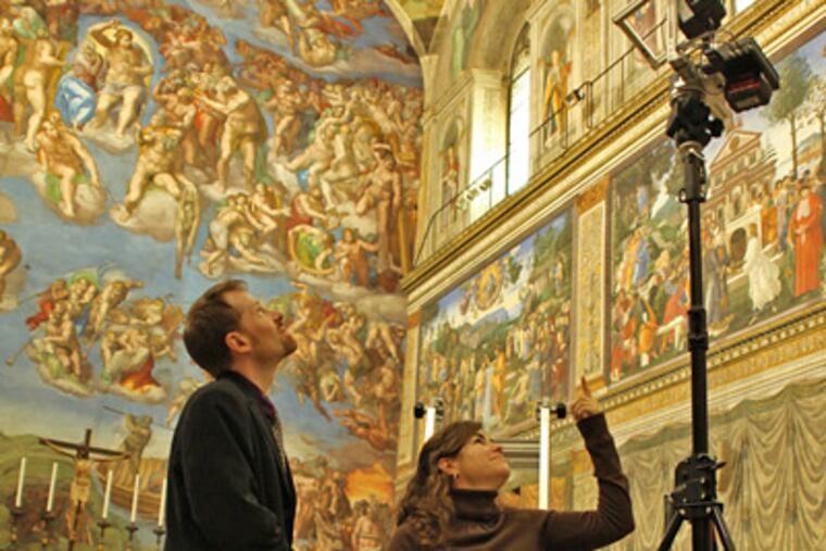 Bryan Crable, chair of Villanova University's Communication Department, works with Villanova student Samantha Coveleski during a virtual tour test shoot of the Sistine Chapel. (Photo courtesy of Villanova University)