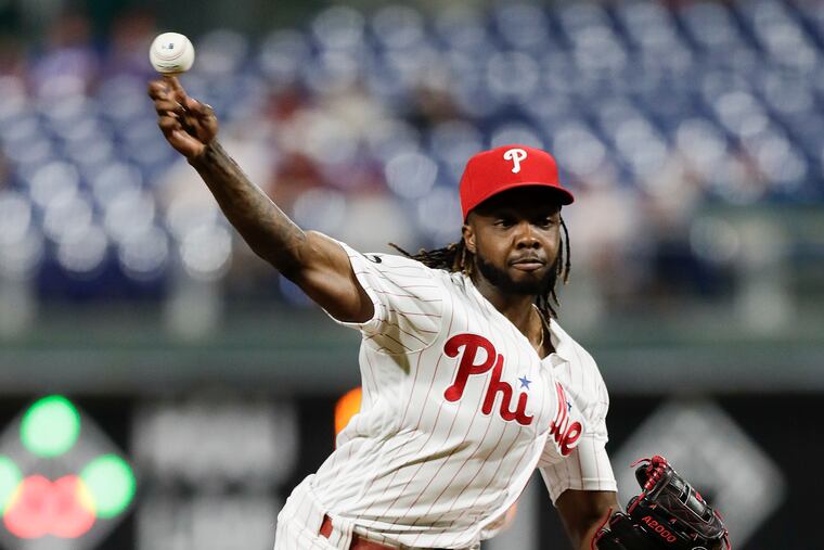 Phillies position player Roman Quinn throws a ninth-inning pitch against the Los Angeles Dodgers on Monday, July 15, 2019 in Philadelphia.