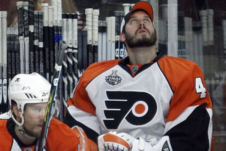 Michael Leighton was pulled after giving up three goals in the first period. (Yong Kim/Staff Photographer)