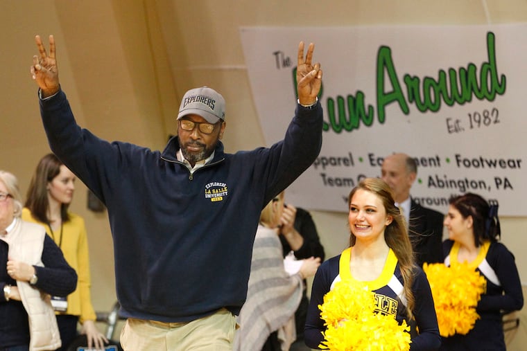 La Salle great Lionel Simmons acknowledges the applause as he is introduced during a halftime ceremony on Feb. 18, 2017. He was part of the 1987 team that was honored, and fans were given a Lionel Simmons bobble heads.