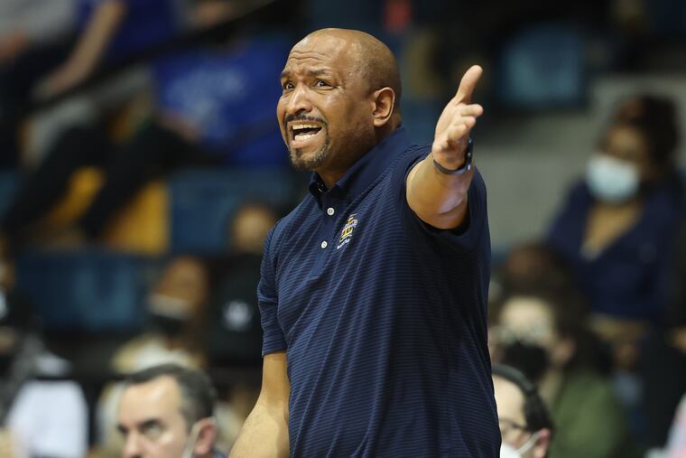 Coach Ashley Howard of La Salle expresses his displeasure with an official's call during their game against St. Louis on Feb. 9.
