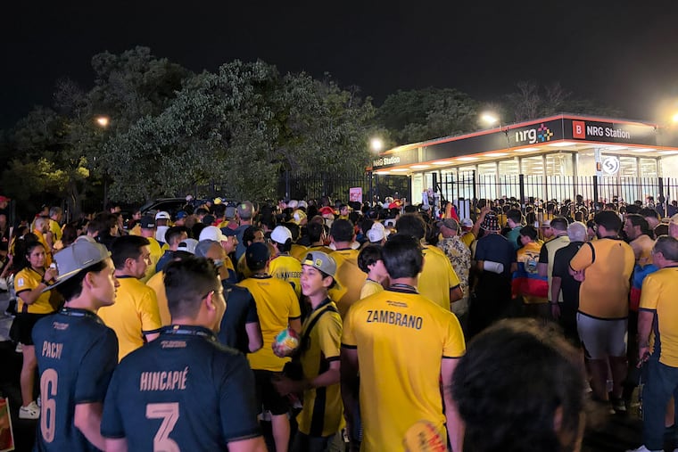 Fans wait outside SEPTA's NRG Station, the Broad Street subway stop closest to the stadium following Ivory Coast's victory over Ecuador June 14.