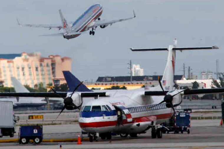 An American Airlines jet takes off from Miami. Those planning to travel during the upcoming holidays will have to pay a little more - again. Several of the largest U.S. airlines have increased a surcharge on the busiest travel days to $20 each way, up from $10. "Fares on those peak days have always tended to be higher," said an American Airlines spokesman.