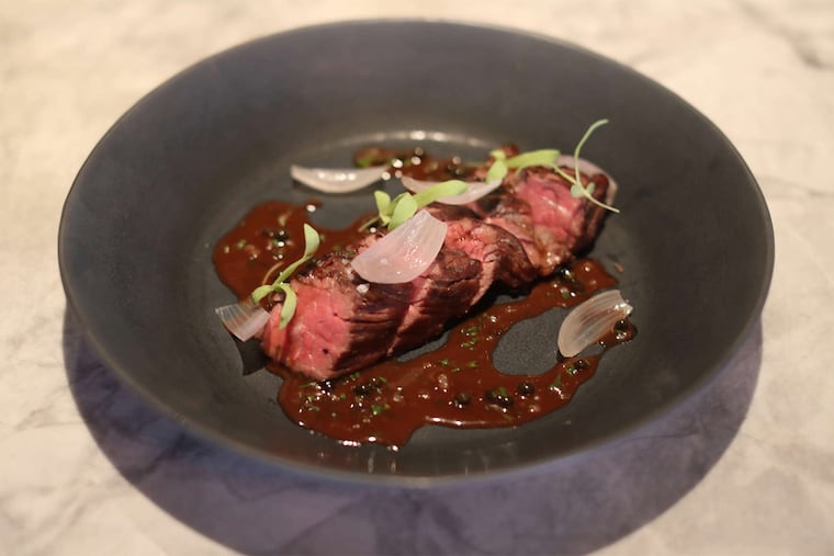 The long-grained bistro steak had an intensely beefy flavor and was topped with a classic red wine peppercorn sauce.