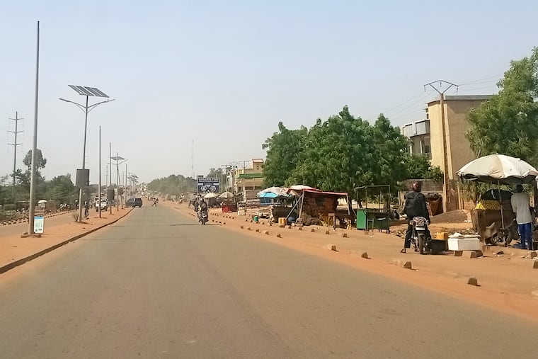 FILE - Motorcyclist ride along a street in Niamey, Niger, Thursday, June 18, 2026. (AP Photo, file)