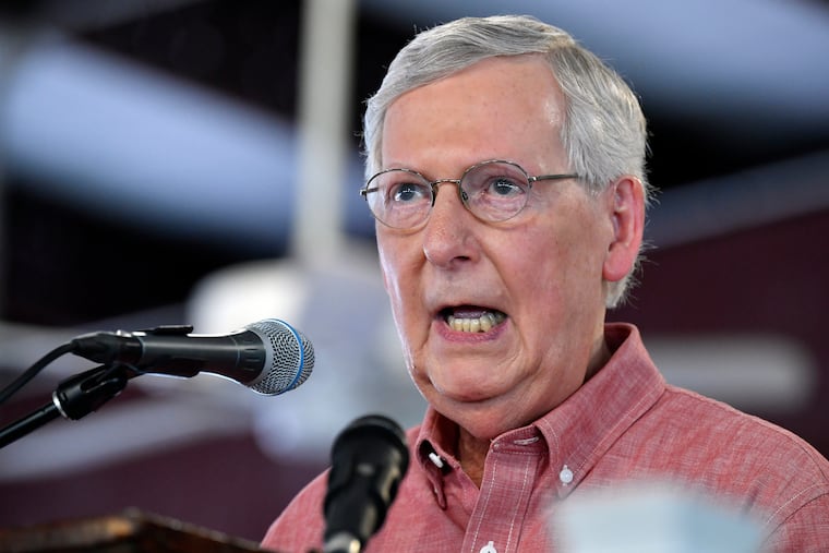 FILE - In this Aug. 3, 2019 file photo, Senate Majority Leader Mitch McConnell, R-Ky., addresses the audience gathered at the Fancy Farm Picnic in Fancy Farm, Ky. The Republican Party, the Trump campaign and other GOP organizations say they are suspending their spending on Twitter to protest the platform’s treatment of Senate Majority Leader Mitch McConnell. Twitter temporarily locked McConnell’s campaign account after it shared a video in which some protesters spoke of violence outside his Kentucky home, where he is recovering from a shoulder fracture.