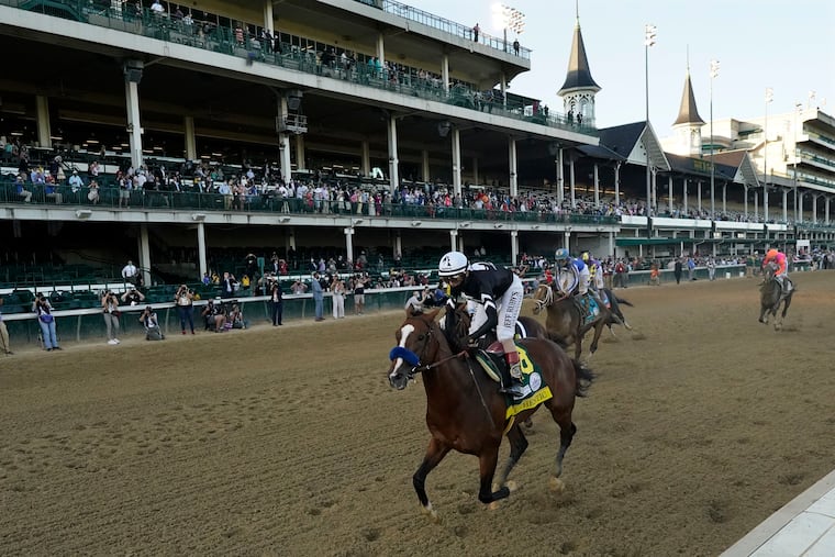Jockey John Velazquez riding Authentic wins the 146th running of the Kentucky Derby at Churchill Downs, Saturday, Sept. 5, 2020, in Louisville, Ky.
