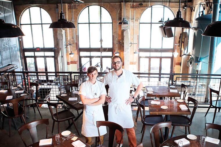 La Peg chef de cuisine Nicholas Bazik and owner and executive chef Peter Woolsey at La Peg. (Stephanie Aaronson/Philly.com)
