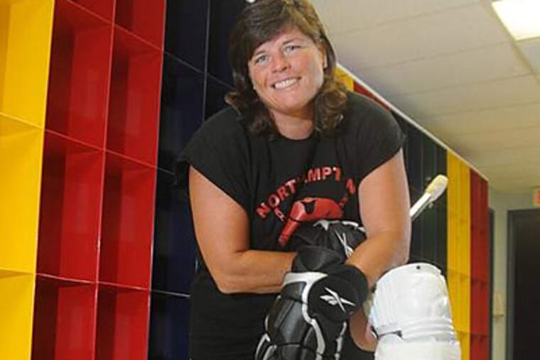 After a 1997 ski accident, a doctor told Terry Ryan that she would never play competitive sports again. (Curt Hudson/For the Daily News)