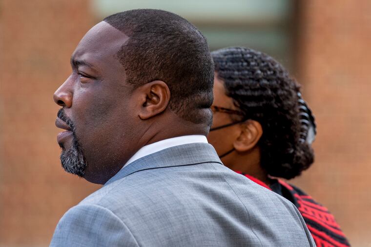 City Councilmember Kenyatta Johnson and his wife, Dawn Chavous, leave the federal courthouse in Center City on Wednesday.