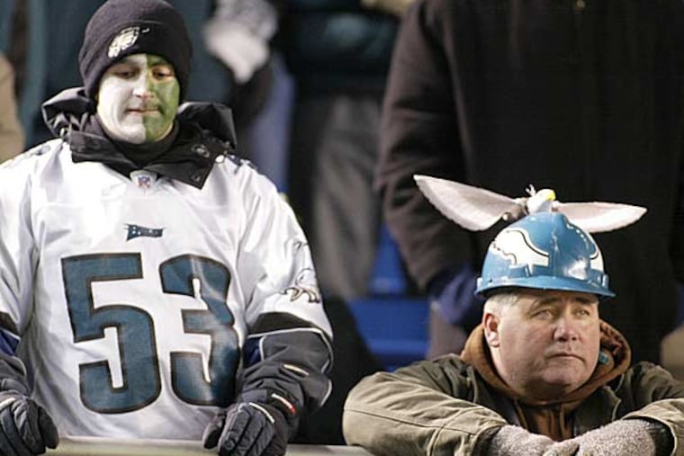 Philadelphia Eagles fans watch as the Tampa Bay Bucaneers defeat the Eagles in the NFC Championship game at Veterans Stadium in Philadelphia, Sunday, Jan. 19, 2003. (George Widman/AP)