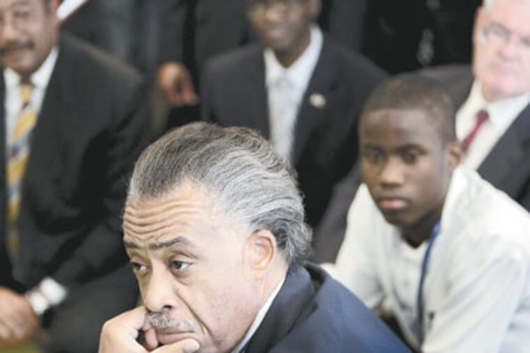 Civil rights leader Al Sharpton, left, listens as students talk during a class at the Mastery Charter School in Philadelphia. ( David Maialetti / Staff Photographer )