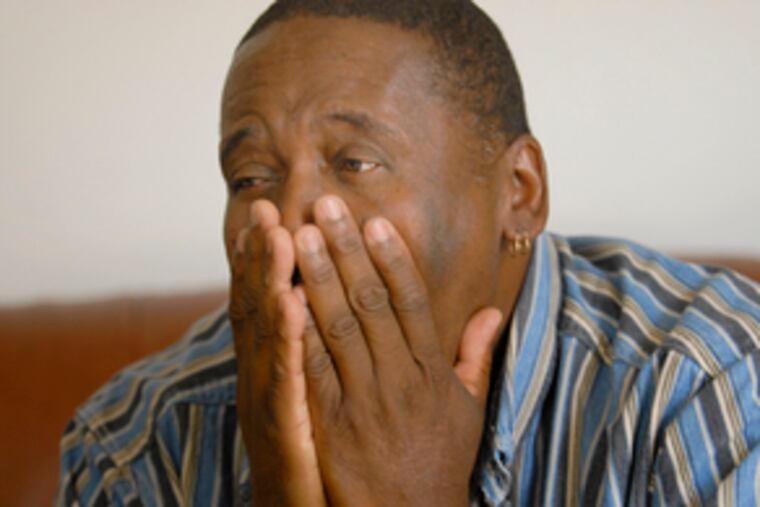 Tyrone Campbell Sr. (above) mourns. "He meant the world to me." Services for Tyrone Campbell Jr. (below, with sisters Twila Taylor, left, and Tyrisha Campbell) will begin at 10 a.m. Saturday at the House of God Baptist Church, 1534 N. Hancock St.