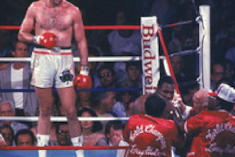 Gerry Cooney (left), the darling of some media, lost to Larry Holmes by TKO.