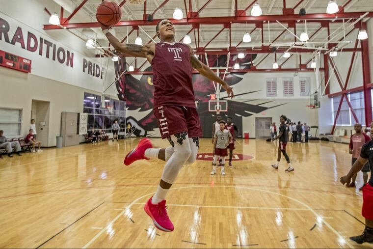 Temple’s #15, Nate Pierre Louis, #15, goes up f a dunk during practice dirlls during Temple media day on Thursday October 5, 2017. MICHAEL BRYANT / Staff Photographer