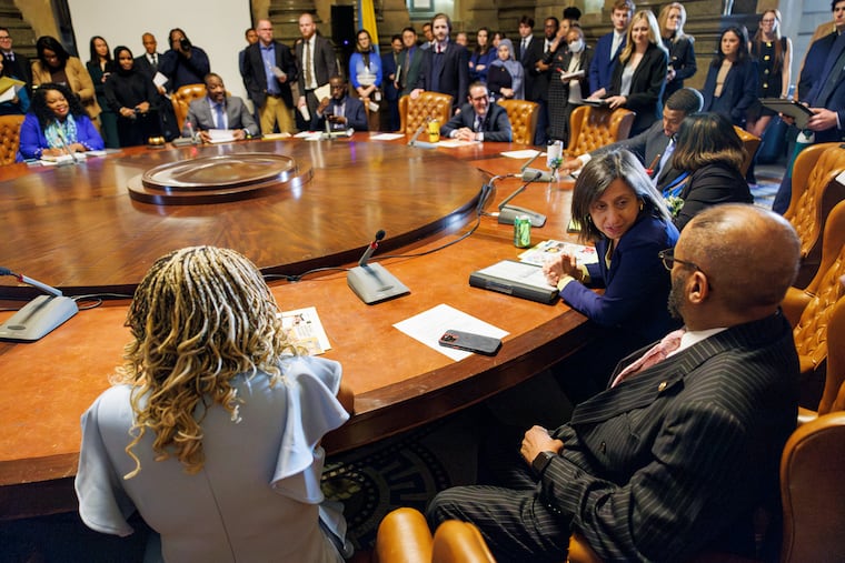 Members of City Council gather in their Caucus Room at City Hall in January. A proposal would amend a rule requiring them to quit the body to run for another office.