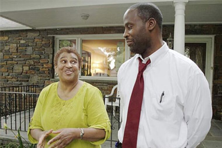 Joyce Mosley and her adopted son, Kevin, 41. Kevin was about 2 when Mosley became one of the first single women in Pennsylvania to adopt. Kevin now has sons of his own and, like his mother, works in human resources. (Elizabeth Robertson / Staff Photographer)