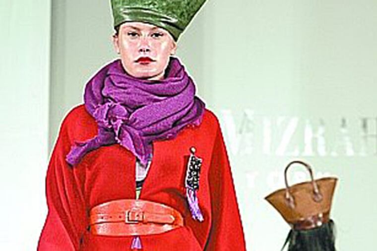 Isaac Mizrahi showed off his collection to a Philadelphia audience at the Bellevue Wednesday. ( Bonnie Weller / Staff Photographer)