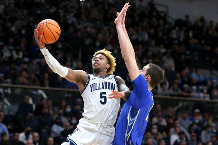 Justin Moore scoring against Creighton.