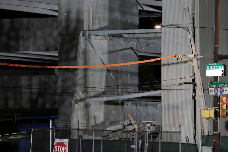 Large cracks in the walls visible in this detail photo of the partial collapse of the still under construction CHOP parking garage at 30th and Grays Ferry Avenue in Philadelphia on Wednesday, April 8, 2026.