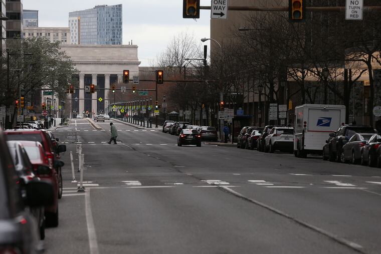 John F. Kennedy Boulevard one day last week. City residents are traveling around more than their suburban counterparts, according to an Inquirer analysis of cell phone records.
