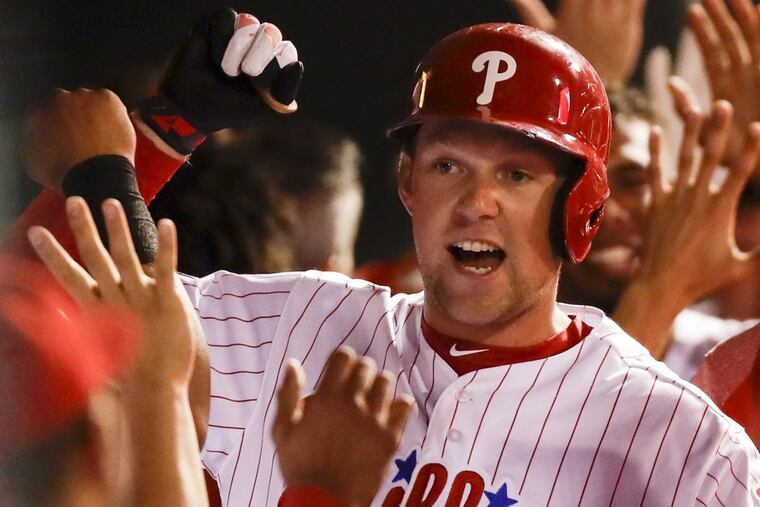 Phillies rookie Rhys Hoskins celebrates his three run third-inning home run with teammates against the Marlins on Wednesday