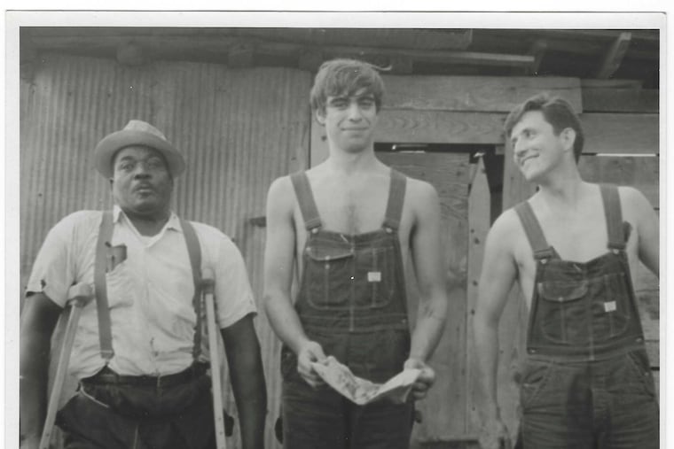 Retired U.S. Magistrate Joel B. Rosen (center) was a civil rights activist in Huntsville, Ala. He and Joe Murphy (right) were the first VISTA volunteers sent there. They posed with Willie Massey, a farmer.