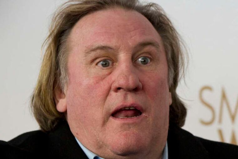 French actor Gerard Depardieu gesturing as he arrives for the Premiere of the movie "Small World" in Berlin, Germany. Gerard Depardieu, the French actor who has been sparring with his native country over taxes, has been granted Russian citizenship. A brief announcement on the Kremlin website said President Vladimir Putin signed the citizenship grant on Thursday Jan. 3, 2013. (AP Photo/Gero Breloer, File)