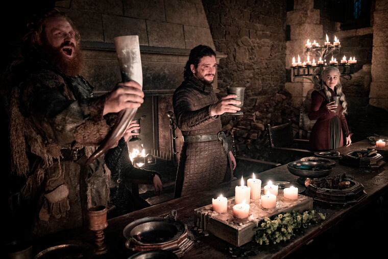 This image released by HBO shows Kristofer Hivju, from left, Kit Harington and Emilia Clarke in a scene from "Game of Thrones." "Game of Thrones," "Veep" and "The Big Bang Theory," three major series that wrapped last season, will find out with Tuesday's nominations if they have one more chance at Emmy gold.
