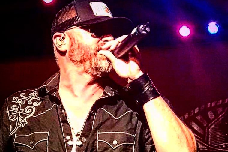 Brett Myers performs with his band "The Backwoods Rebels" at a concert in November.