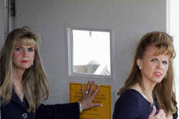 The Sisters Orie: State Sen. Jane (left) and Janine (far left), who are charged with using the senator's staff to do campaign work on behalf of state Supreme Court Justice Joan Orie Melvin (right).