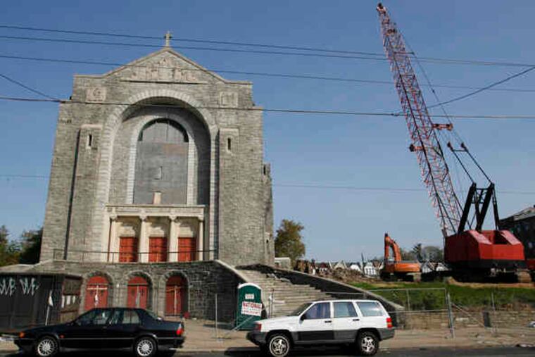 As Transfiguration is taken down, the work goes on to save some of the mosaics (right).
