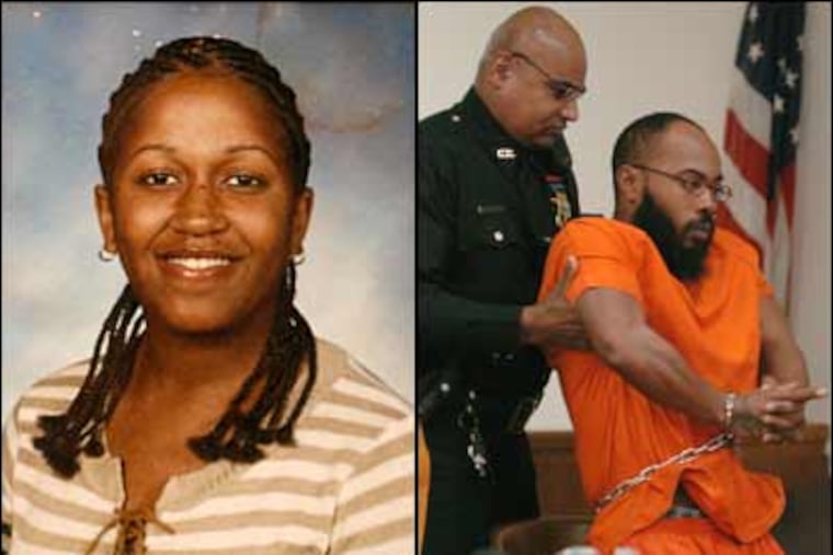 Warren Dixon, (right), is pulled to his feet after refusing to stand during an arraignment today in the 2003 killing of 16-year-old Sherita Williams.